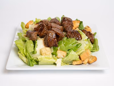 Steak Tip Salad: seared steak tips over romaine with croutons and shaved cheese
