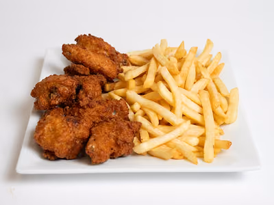 Wings and Fries: crispy fried chicken wings next to a pile of fries